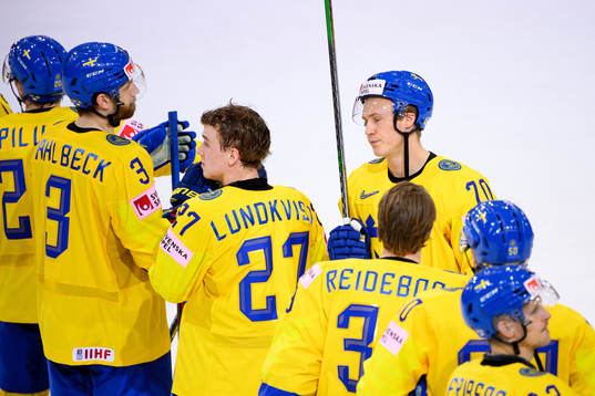 Nils Lundkvist and Dennis Rasmussen of Sweden look dejected