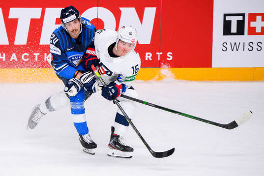 Hannes Bjorninen of Finland and Ryan Donato of USA