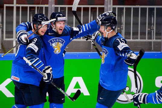 Olli Maatta, Iiro Pakarinen and Anton Lundell of Finland