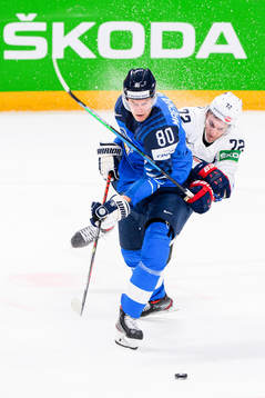 Saku Mäenalanen of Finland and Tage Thompson of USA