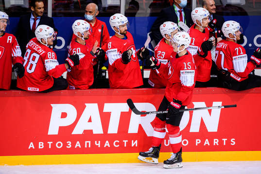 Gregory Hofmann of Switzerland celebrates scoring the 2-5