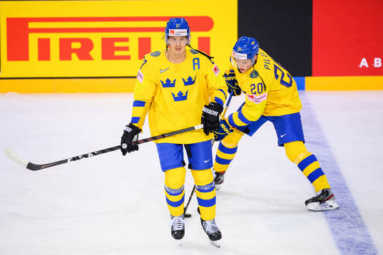 Rickard Rakell and Lawrence Pilut of Sweden