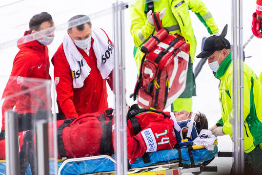 Yevgeni Lisovets of Belarus receives medical attention