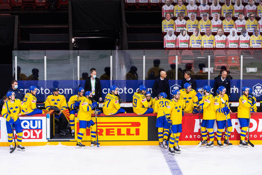 Players of Sweden waits when Yevgeni Lisovets of Belarus