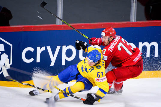 Rickard Rakell of Sweden against Dmitri Znakharenko of