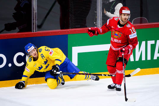 Rickard Rakell of Sweden and Nick Bailen of Belarus