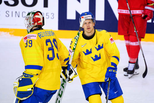 Goalkeeper Adam Reideborn and Max Friberg of Sweden