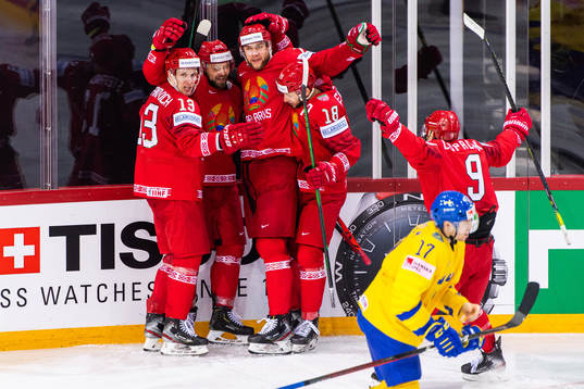 German Nesterov of Belarus celebrates with team mates
