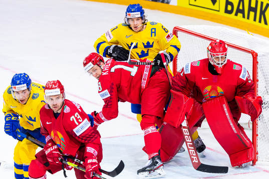 Rickard Rakell of Sweden competes with Kristian Khenkel and