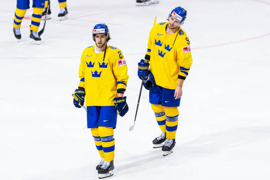 Mario Kempe and Adrian Kempe of Sweden look dejected