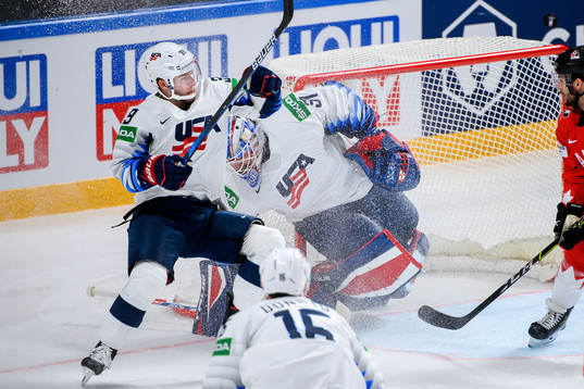 Zac Jones  and goalkeeper Anthony Stolarz of USA