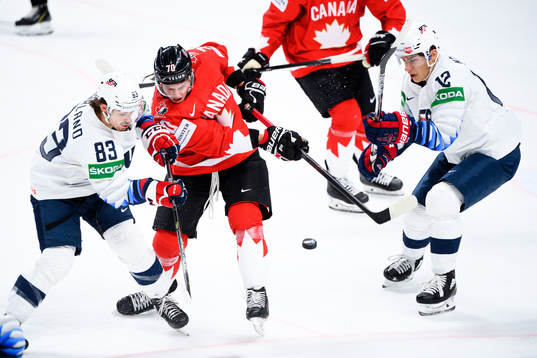 Troy Stecher of Canada against Conor Garland and Trevor