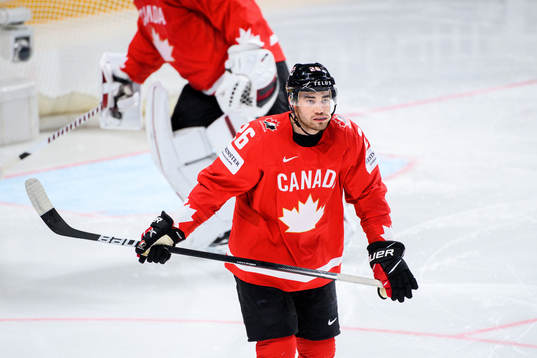 Sean Walker of Canada looks dejected
