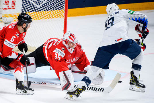 Jason Robertson of USA against goalkeeper Darcy Kuemper of