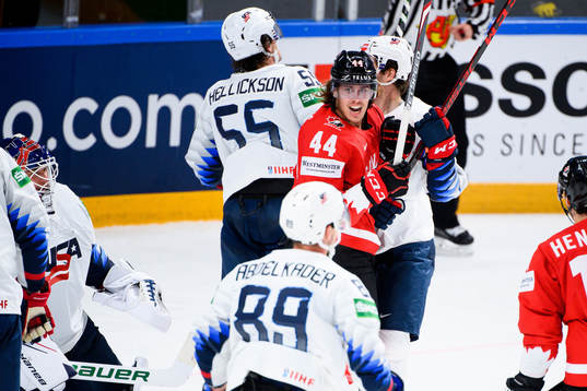 Maxime Comtois of Canada celebrates the 1-4 goal