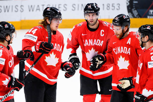 Maxime Comtois of Canada celebrates the 1-4 goal