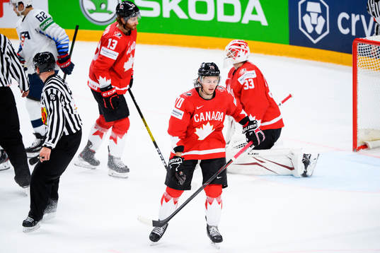 Troy Stecher of Canada looks dejected