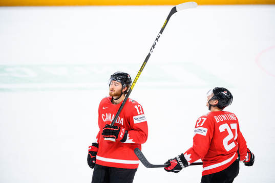 Gabriel Vilardi and Michael Bunting of Canada looks dejected