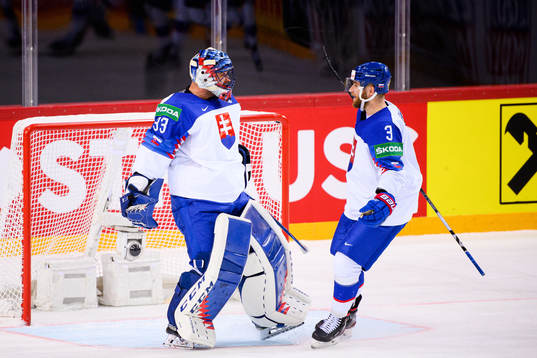 Goalkeeper Julius Hudacek and Adam Janosik of Slovakia