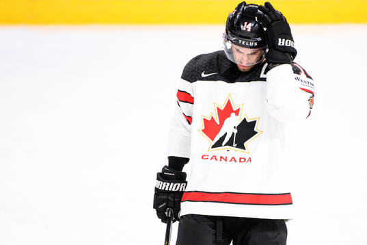 Adam Henrique of Canada looks dejected