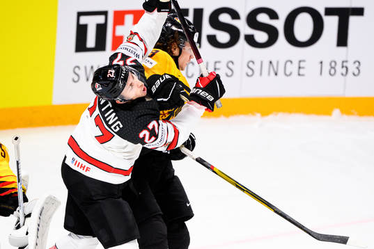Moritz Seider of Germany against Michael Bunting of Canada
