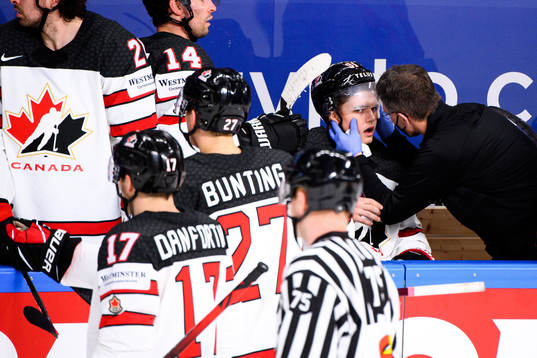 Cole Perfetti of Canada in pain