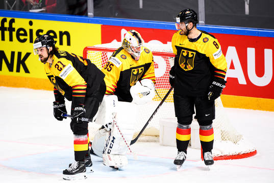 Nicolas Krammer, goalkeeper Mathias Niederberger and Tobias