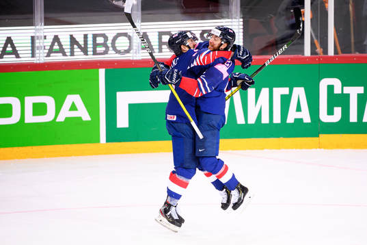 Ben Lake and Mike Hammond of Great Britain celebrate the