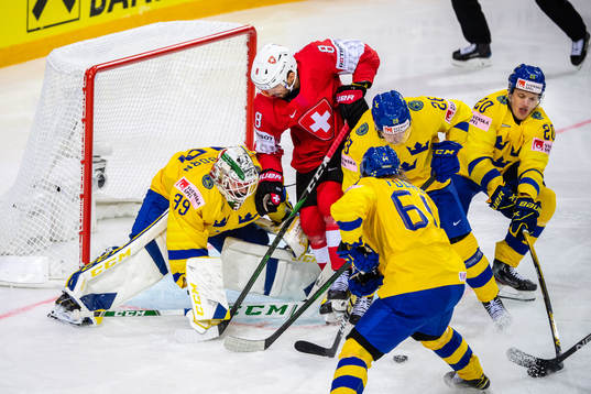 Goalkeeper Adam Reideborn of Sweden and Vincent Praplan of