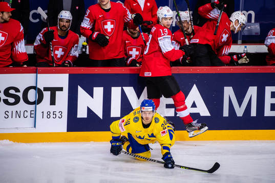 Nico Hischier of Switzerland and Oscar Lindberg of Sweden