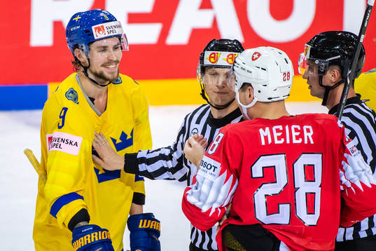 Adrian Kempe of Sweden and Timo Meier of Switzerland