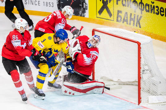 Adrian Kempe of Sweden and Janis Moser, Ramon Untersander