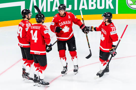 Connor Brown of Canada celebrates with team mates