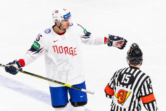 Tommy Kristiansen of Norway reacts against the a referee