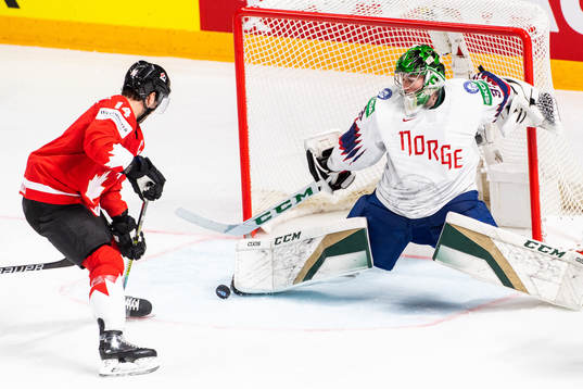 Adam Henrique of Canada is denied a goal by goalkeeper