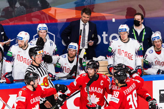 Adam Henrique of Canada celebrates with team mates