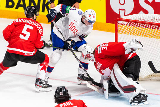 Samuel Solem of Norway against goalkeeper Darcy kuemper of
