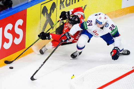 Andrew Mangiapane of Canada and Julian Holm Ole of Norway