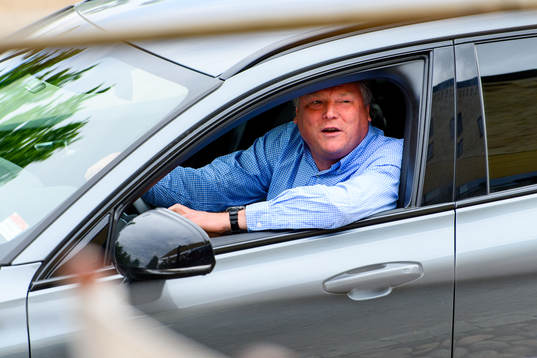Jörgen Lennartsson, head coach of Helsingborg drives by a