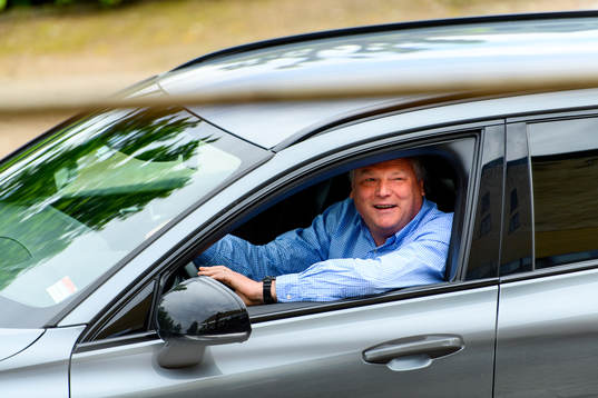 Jörgen Lennartsson, head coach of Helsingborg drives by a