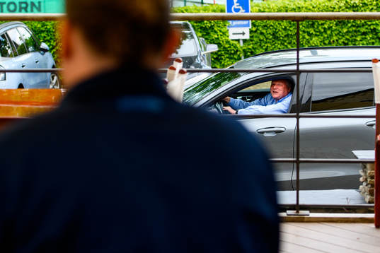 Jörgen Lennartsson, head coach of Helsingborg drives by a