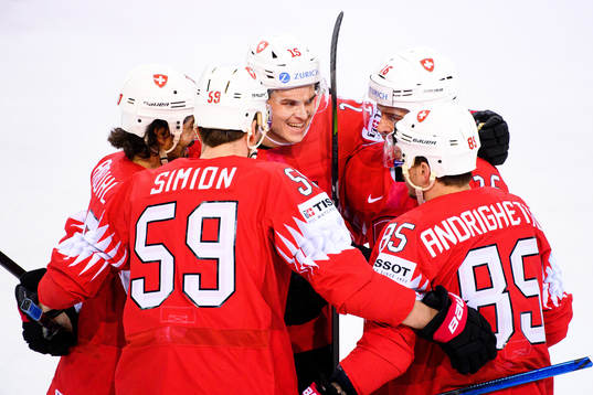Gregory Hofmann and Raphael Diaz of Switzerland celebrates