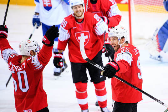 Romain Loeffel of Switzerland celebrates the 3-0 goal