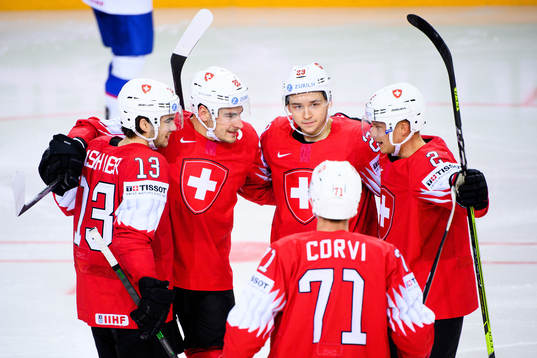 Timo Meier and Philipp Kurashev of Switzerland celebartes