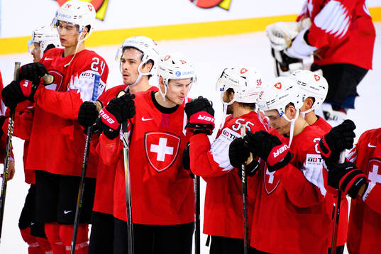 Gregory Hofmann of Switzerland celebrates
