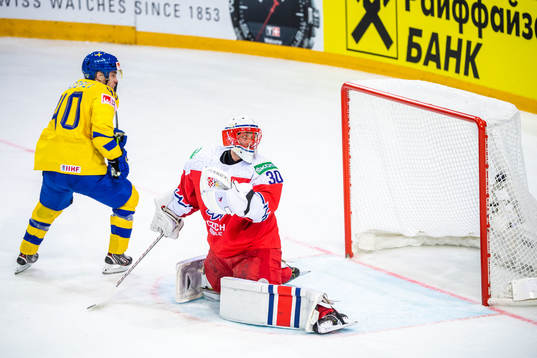 Andreas Wingerli of Sweden scores 1-0 behind goalkeeper