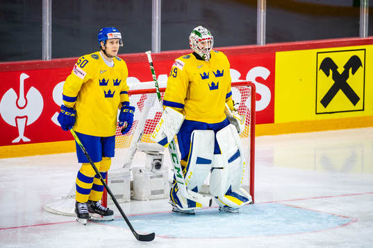 Viktor Lööv and goalkeeper Adam Reideborn of Sweden looks