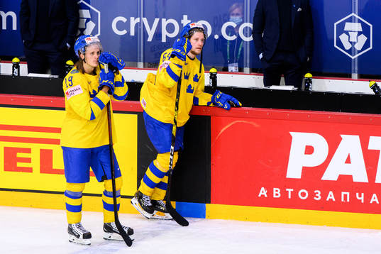 Marcus Sörensen and Jonathan Pudas of Sweden look dejected