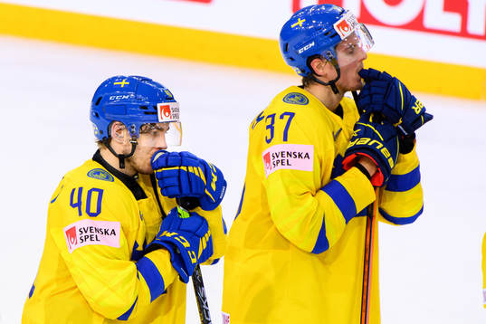 Andreas Wingerli and Isac Lundström of Sweden look dejected