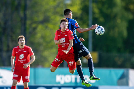 Mathias Knutsen Rasmussen of Brann and Kosuke Kinoshita of